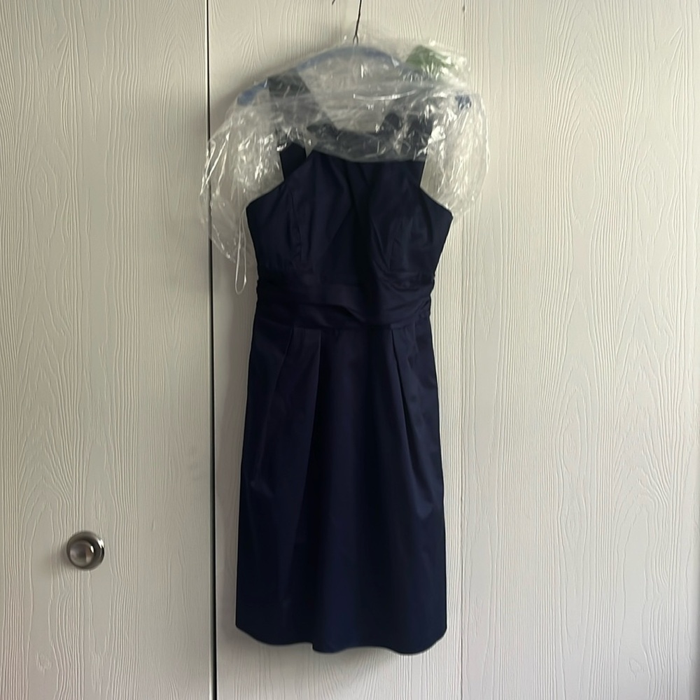 Navy blue knee-length bridesmaid dress from David’s Bridal.